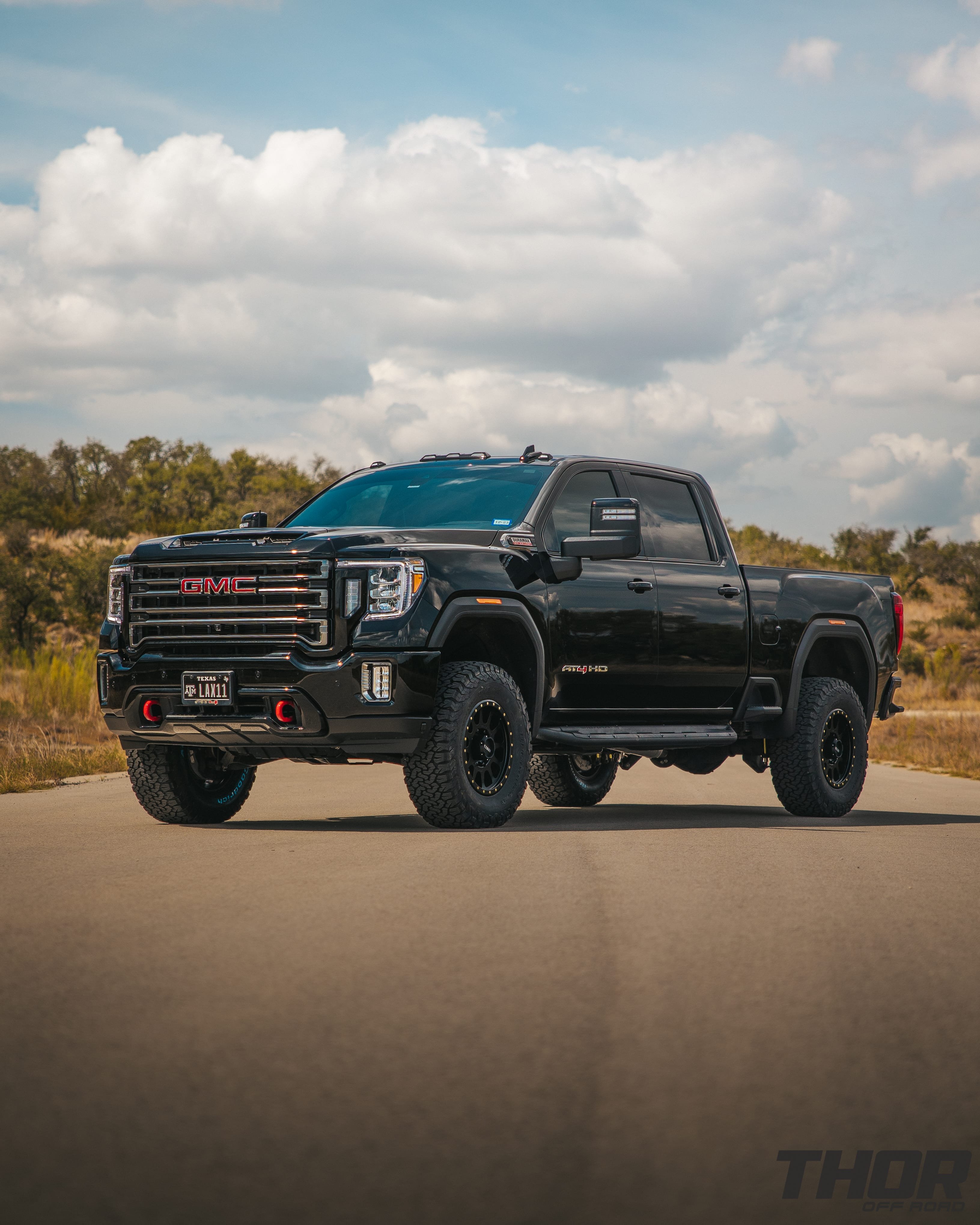 2022 GMC Sierra 2500 HD AT4 in Onyx Black with 3" Cognito Performance Suspension Kit, 18" Method 305 NV Wheels, 35x12.50R18 BFG KO2 Tires, ReadyLift Air Bag Kit