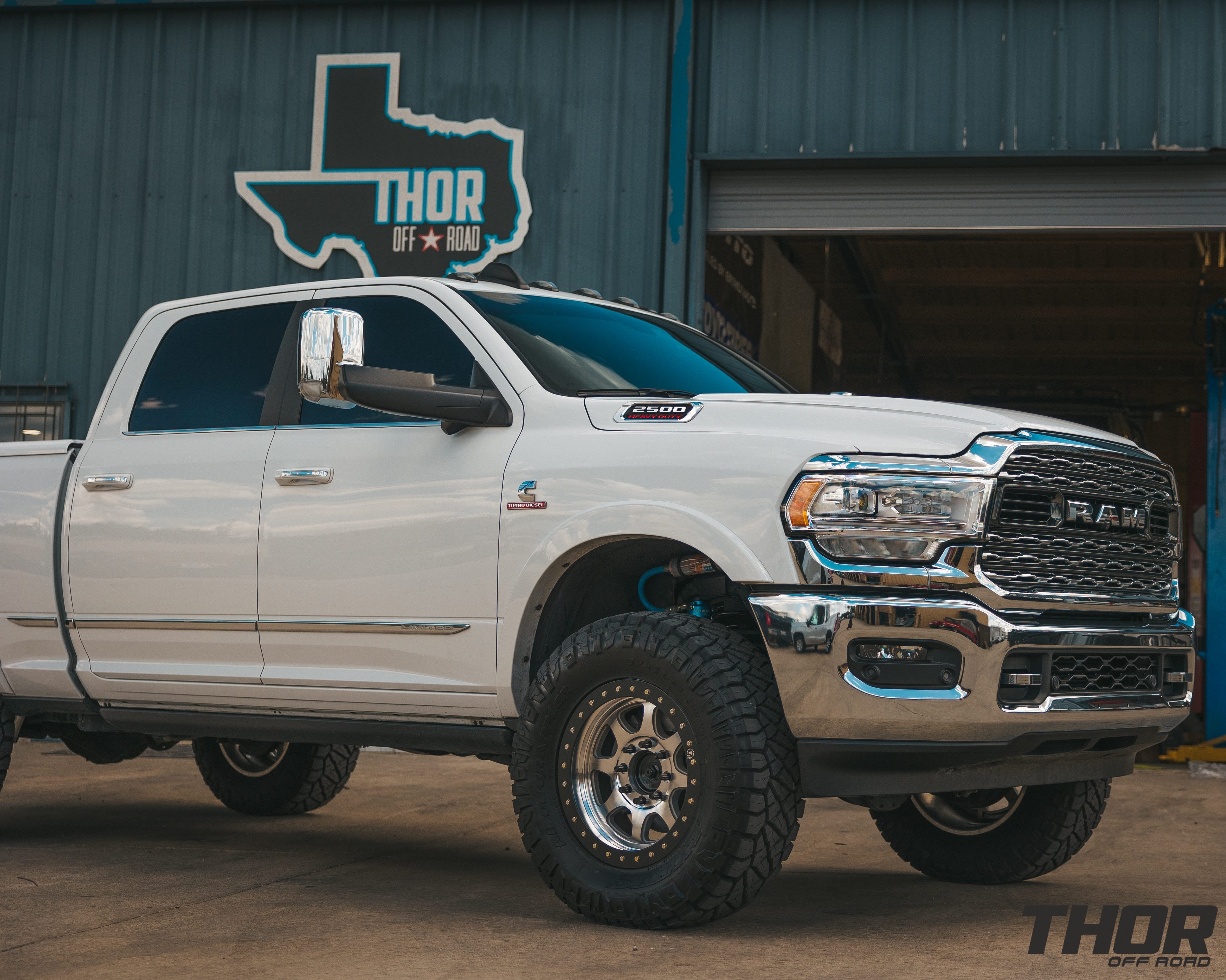 2021 RAM 2500 Limited in White with 3.25" Carli King Pintop Suspension, 37x12.50R18 Nitto Ridge Grappler Tires, 18" Trail Ready Machined Wheels with Black Rings
