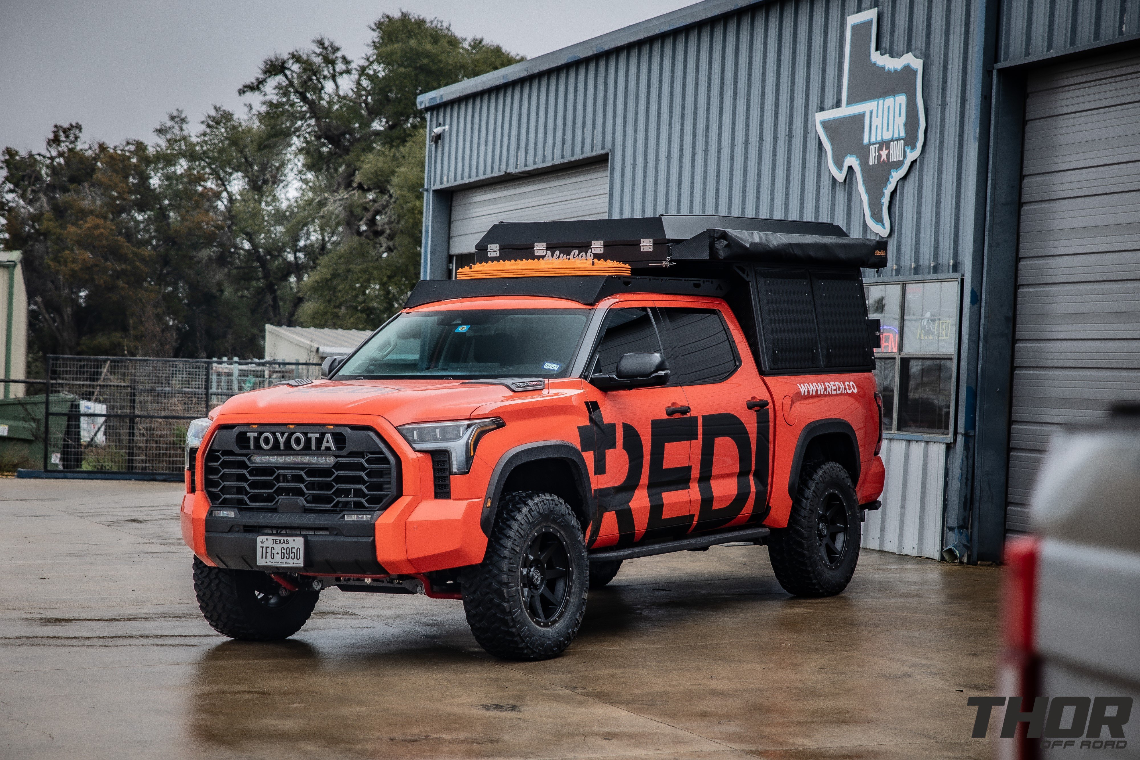 2023 Toyota Tundra TRD Pro in Solar Octane with Icon 6" Stage 5 Suspension Kit, Icon Recoil 20"x9" Wheels, Nitto Trail Grappler 37x12.50R20 Tires