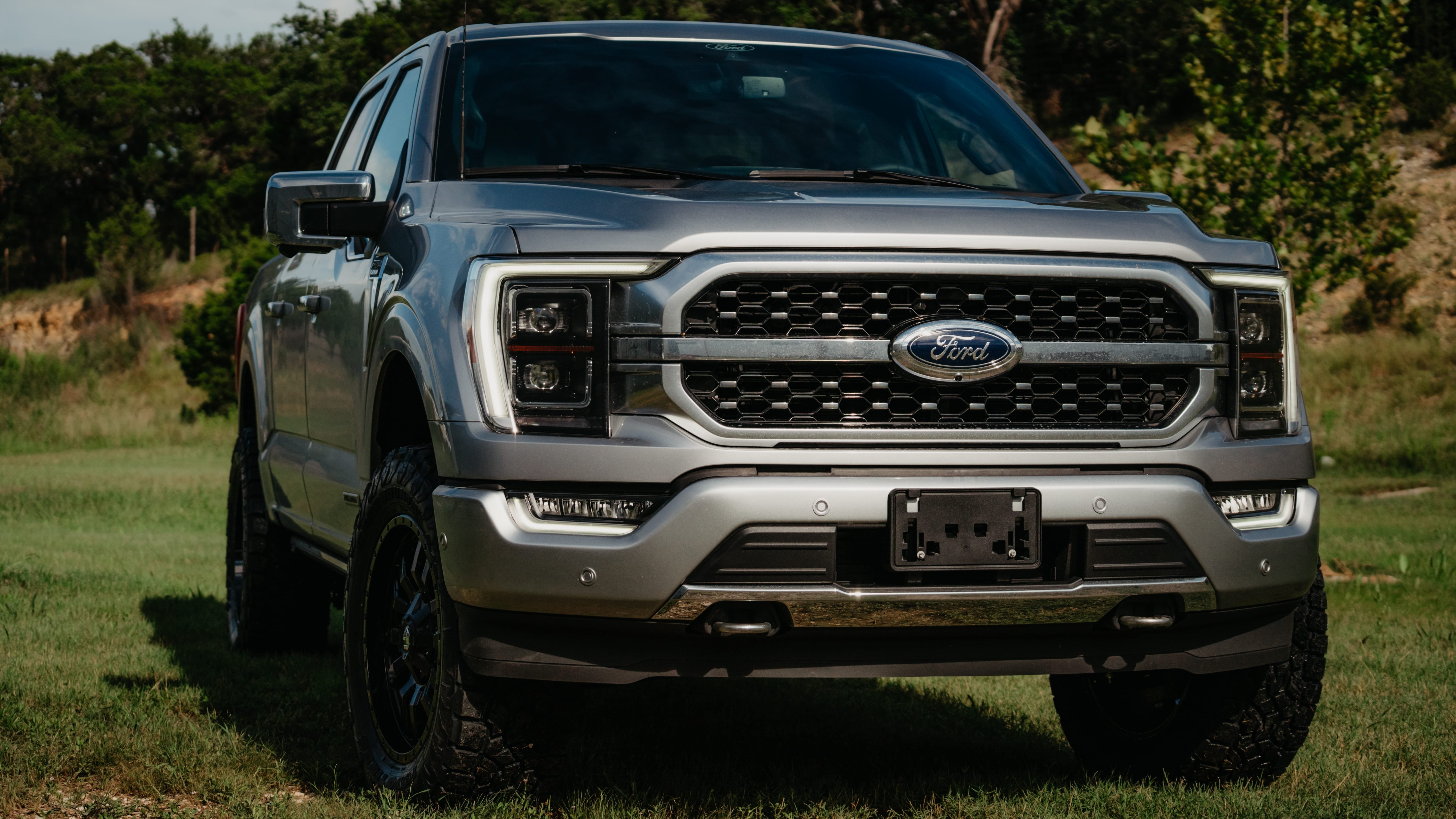2021 Ford F-150 Platinum in Silver with Open Country ATIII 295/60R20 Tires, 20" Fuel Wheels