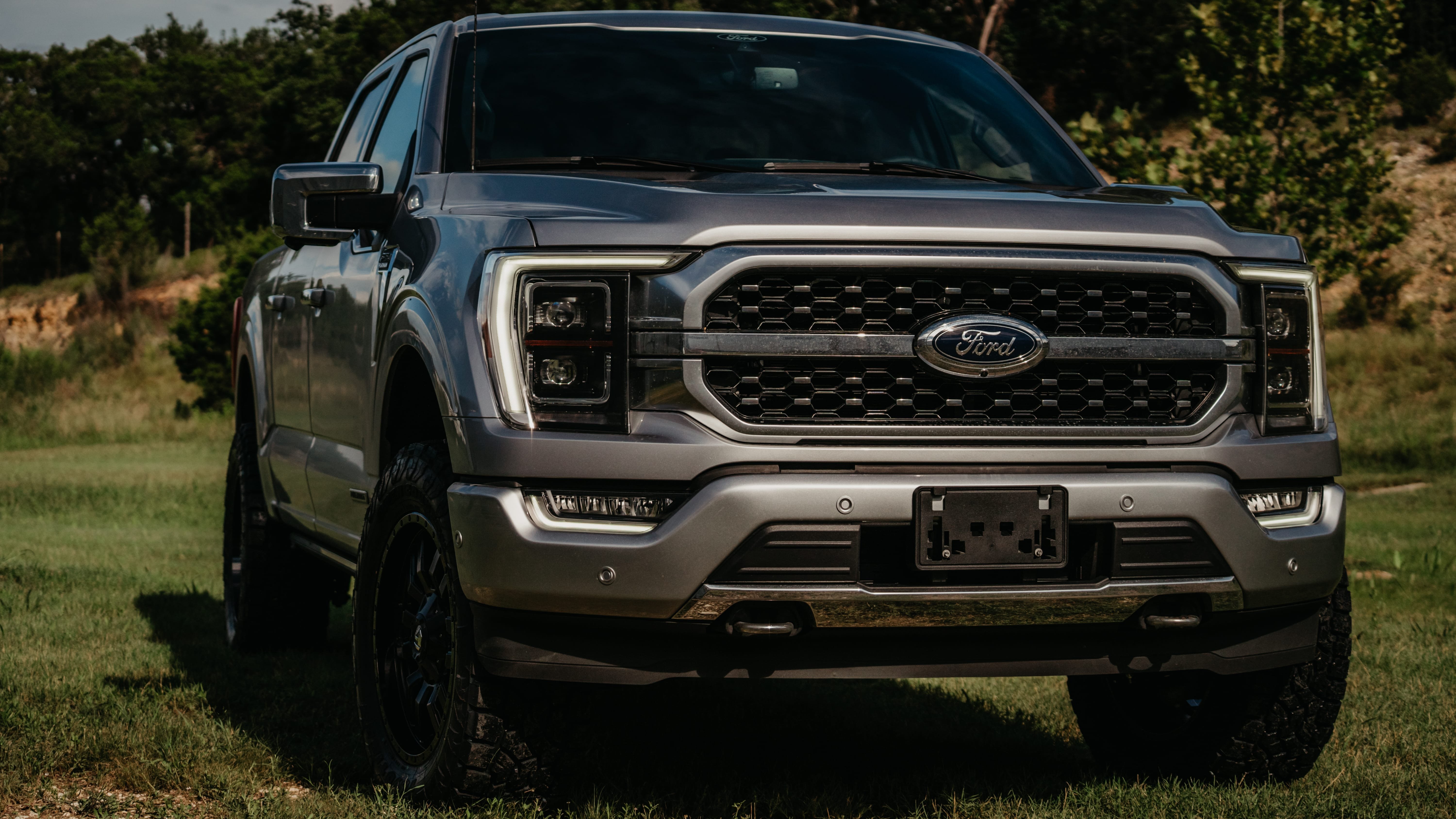 2021 Ford F-150 Platinum in Silver with Open Country ATIII 295/60R20 Tires, 20" Fuel Wheels