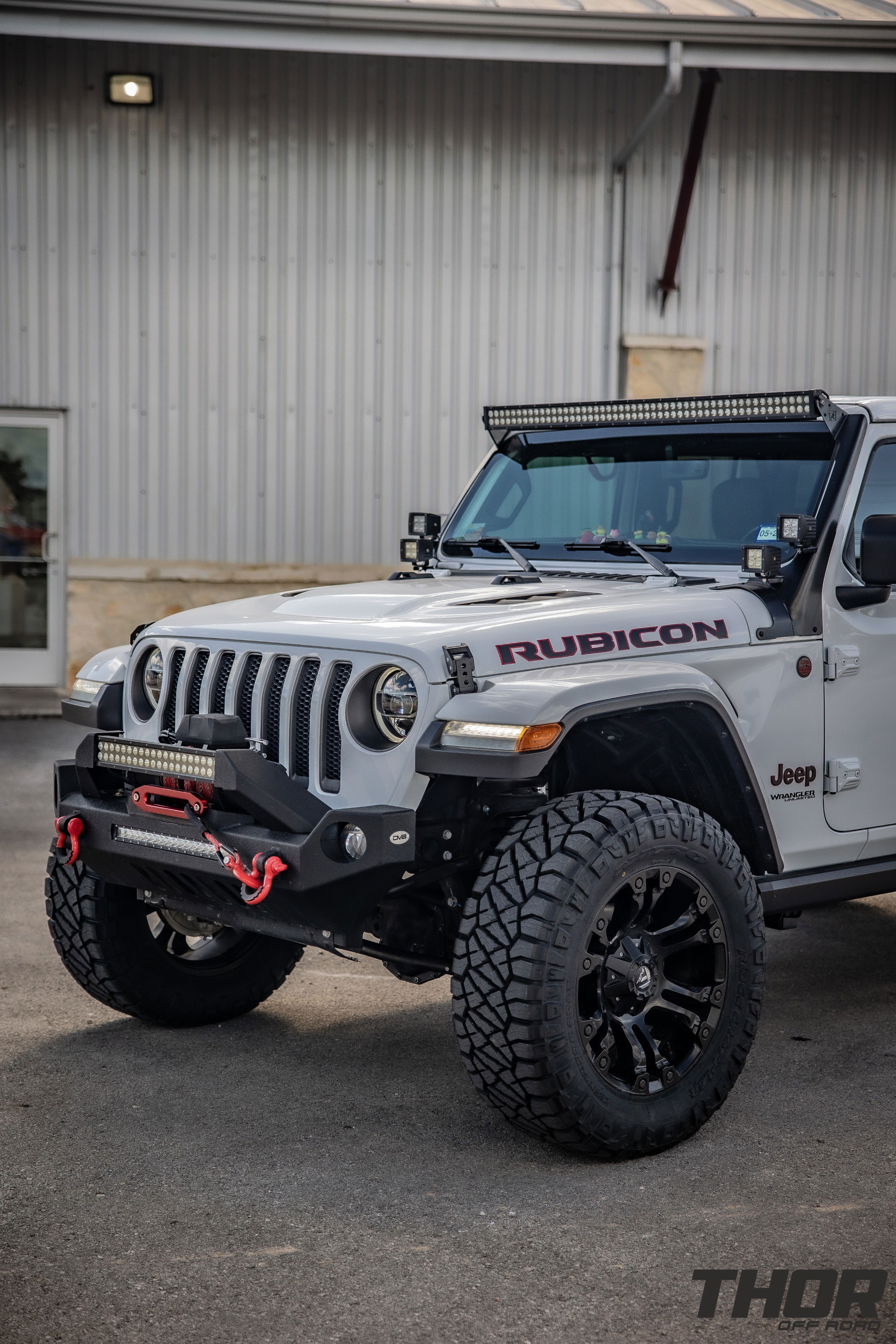 2022 Jeep Wrangler Unlimited Rubicon in White with 3" Lift Kit, Power Running Boards, Nitto Ridge Grappler 35x12.50R20, S&B Cold Air Intake, Auxillary Lighting