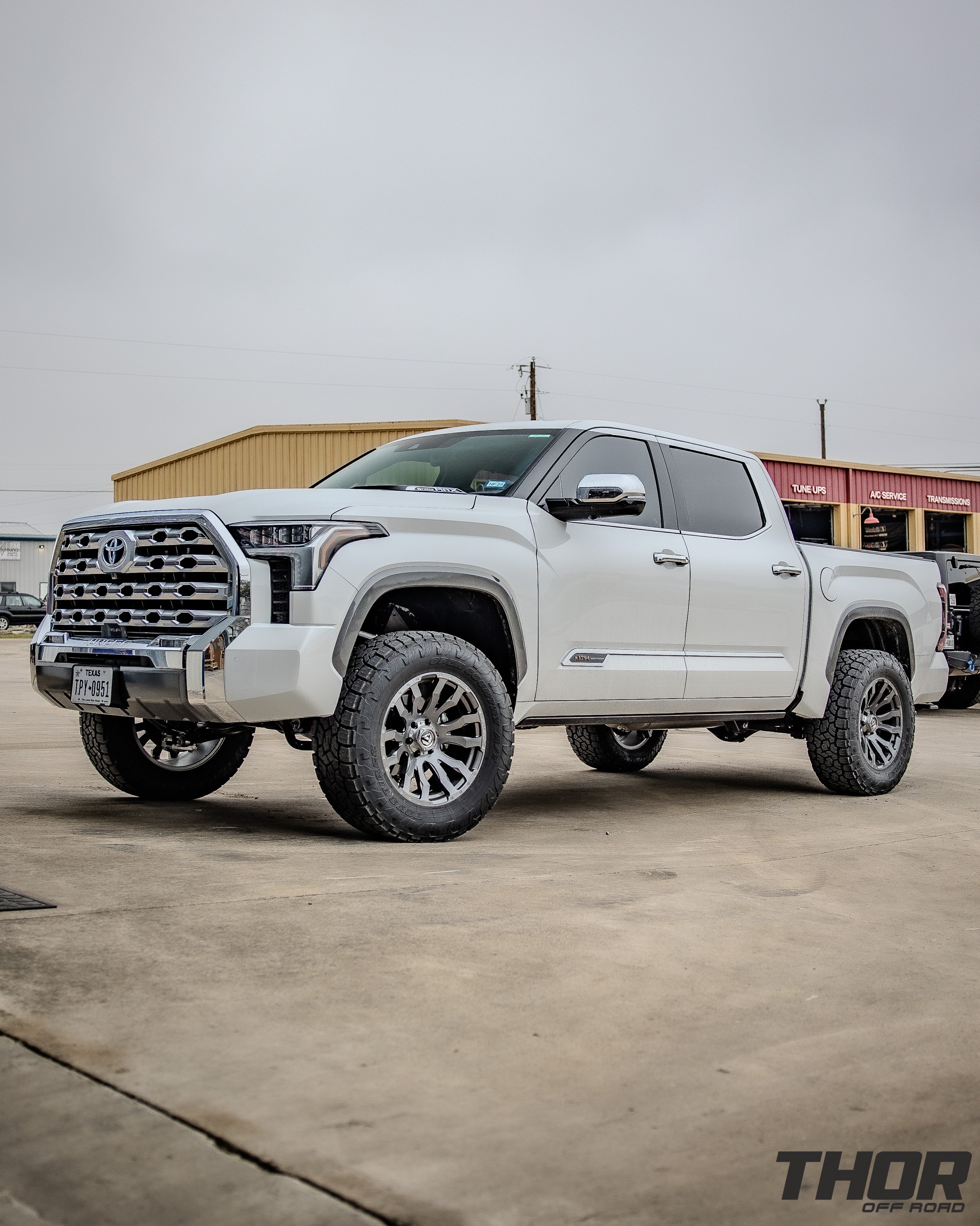 2023 Toyota Tundra 1794 Edition in Wind Chill Pearl with Rough Country 3.5" Lift Kit, Fuel Blitz 20x9" Wheels, 35x12.50R20 Toyo ATIII Tires