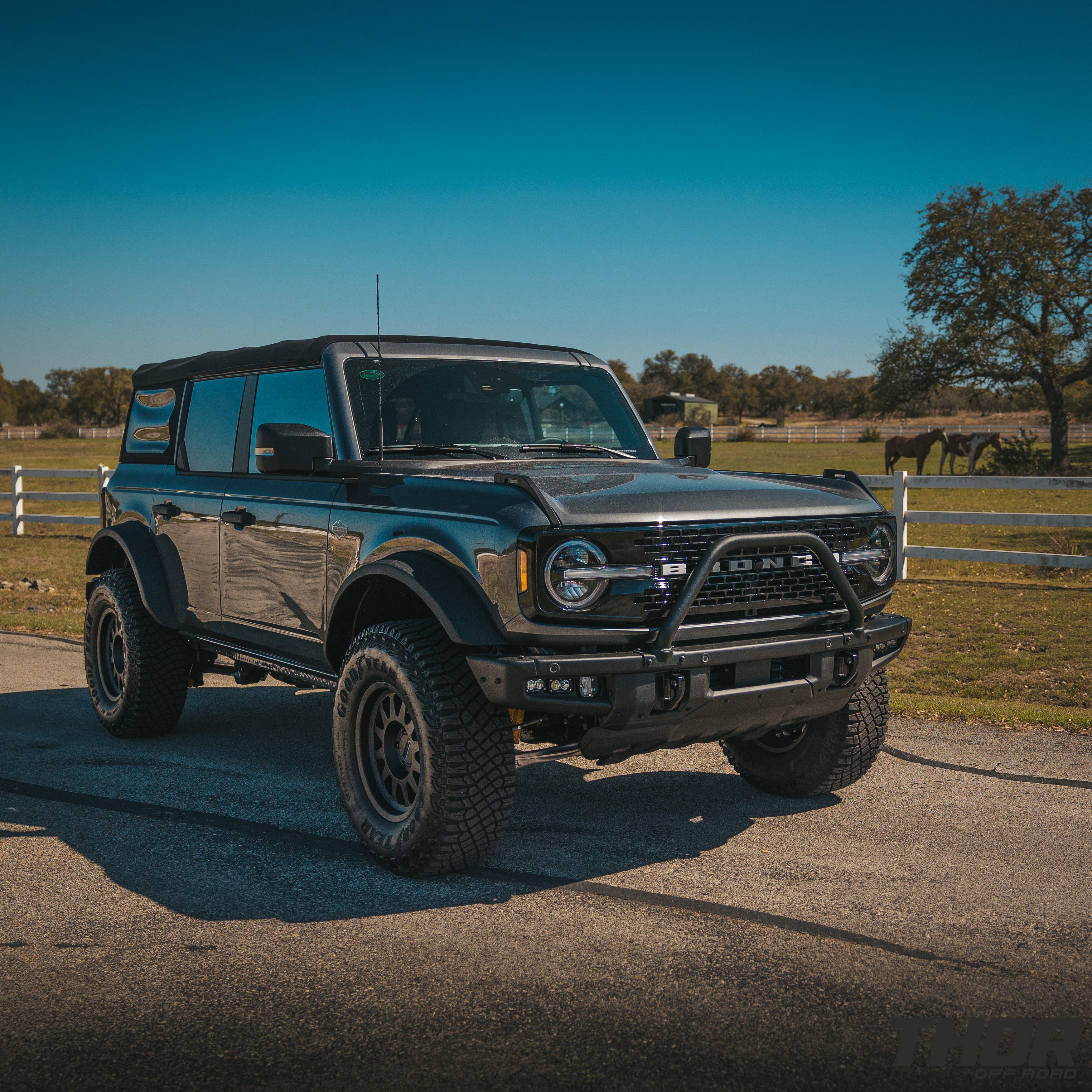 2022 Ford Bronco Wildtrak in Grey with 1" Rough Country Level Kit, 17x8.5" Method MR704 Wheels, Baja Design Fog Light Pocket Kit