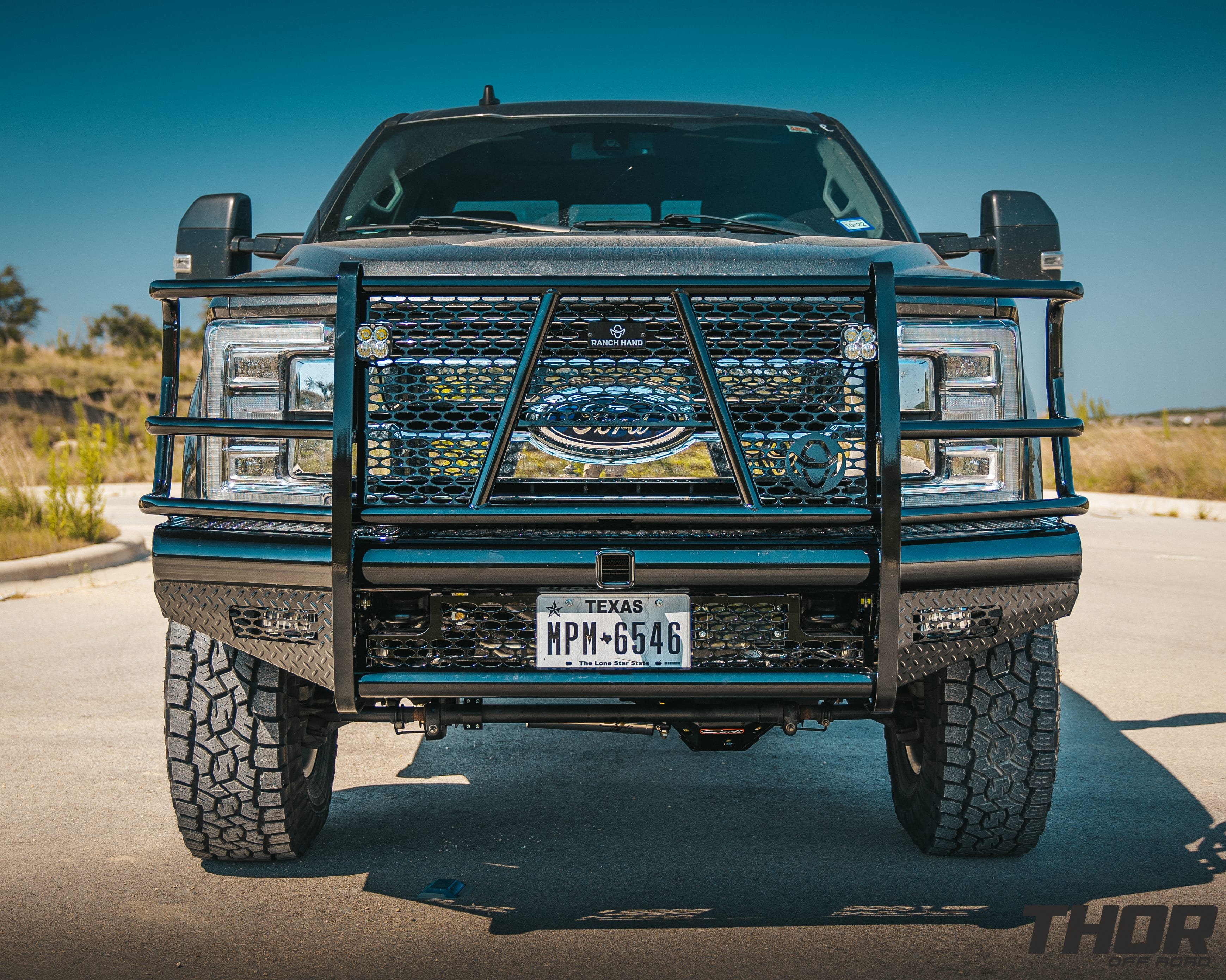 2019 Ford F-250 Super Duty Lariat in Grey with Carli 3.5" Suspension Kit, Carli Low Mount Steering Stabilizer, Carli High Mount Steering Stabilizer, Carli Add-A-Pack Spring Replacement, Carli Torsion Sway Bar, Method 315 18x9" Machine Finished Wheels, Toyo ATIII 37x12.50R18 Tires, Ranch Hand Legend Front and Rear Bumpers, Baja Design Squadron Lighting