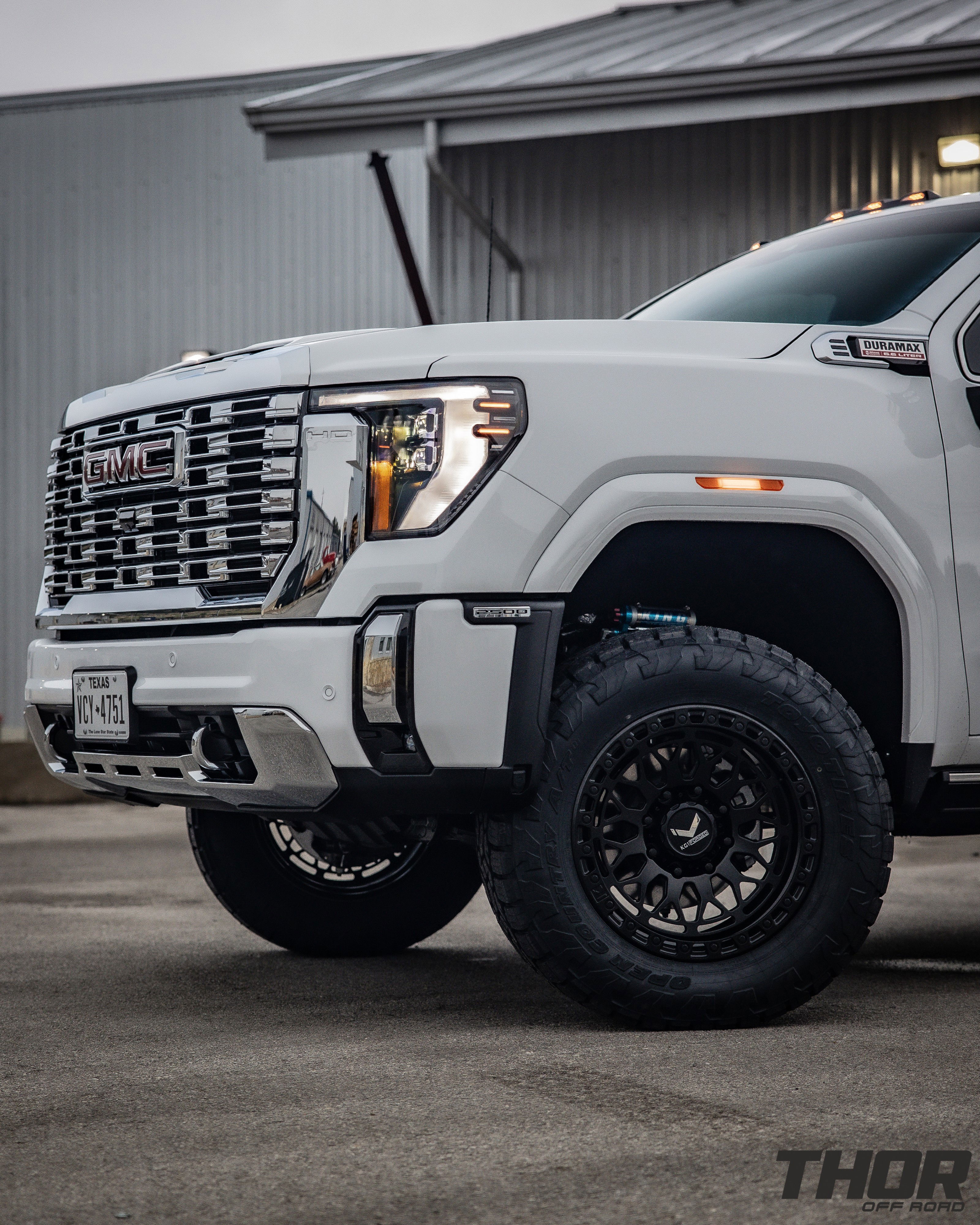 2024 GMC Sierra 2500 HD Denali in White with Cognito 3" Elite Leveling Kit, Toyo Open Country A/T III 35x12.50R20, KG1 DiamondHead 20x9.5" Wheels, Retrax Pro MX Bed Cover, Bedslide Classic