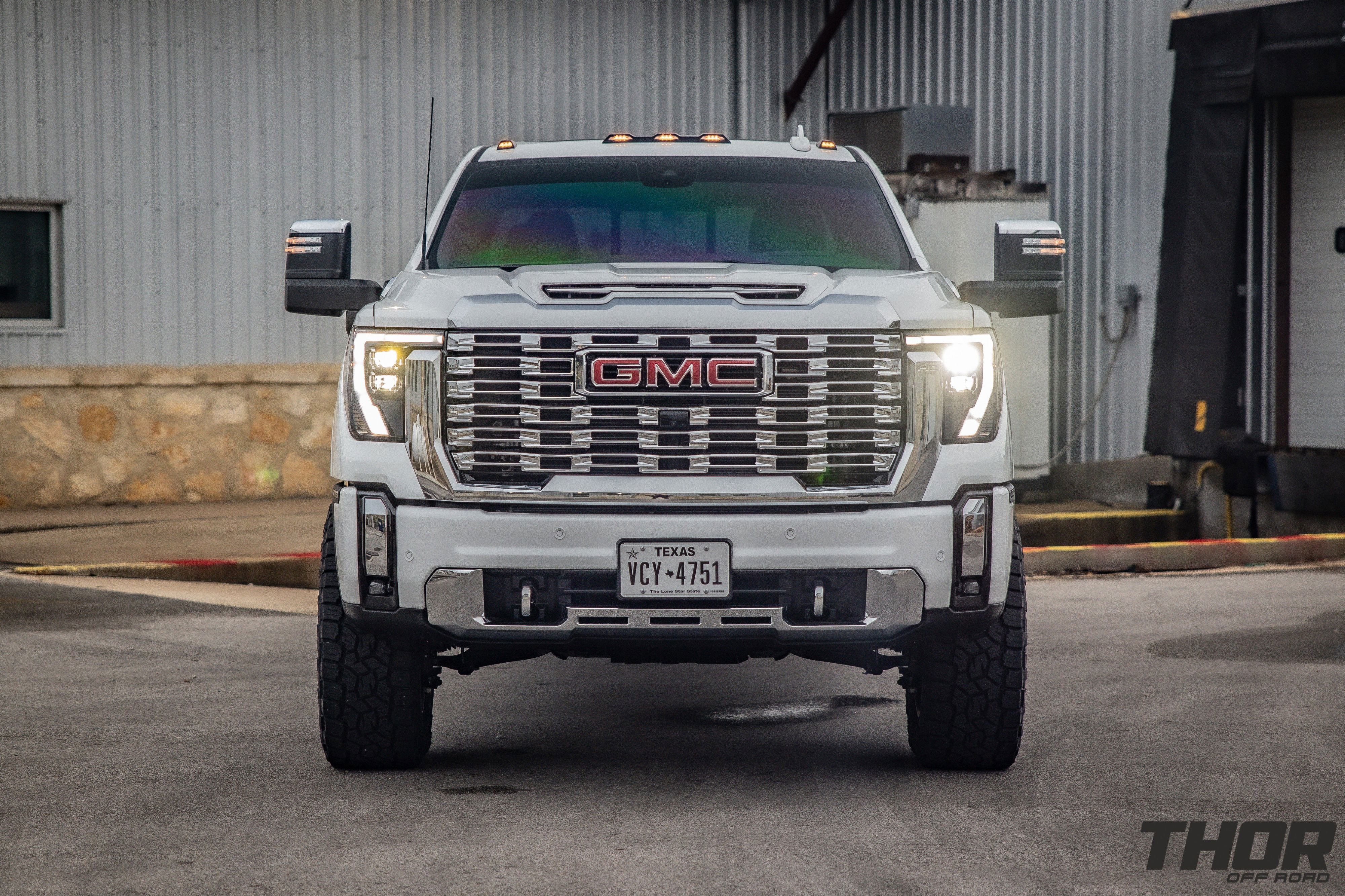 2024 GMC Sierra 2500 HD Denali in White with Cognito 3" Elite Leveling Kit, Toyo Open Country A/T III 35x12.50R20, KG1 DiamondHead 20x9.5" Wheels, Retrax Pro MX Bed Cover, Bedslide Classic