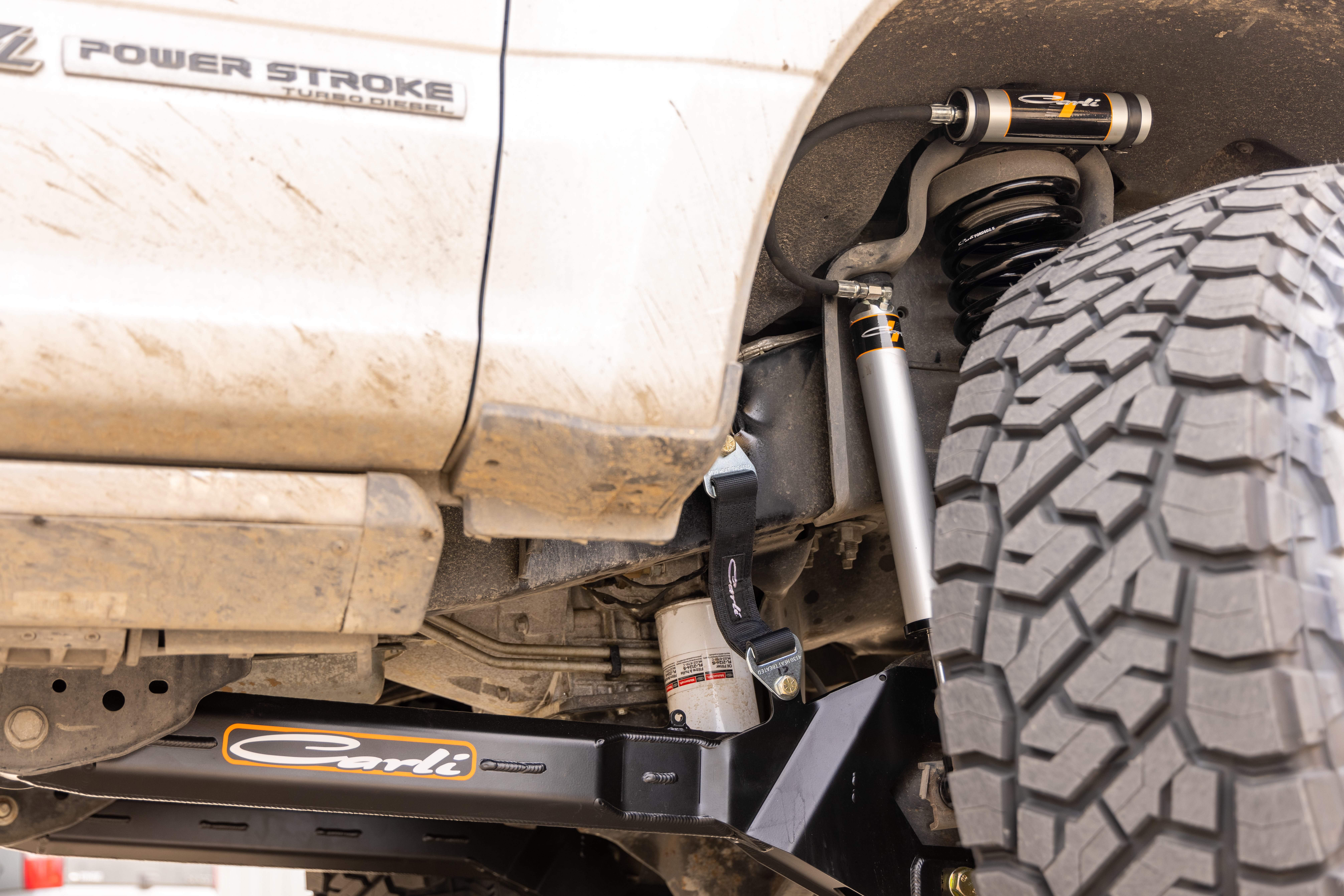 2017 Ford F-250 Super Duty Lariat in Silver with Carli 3.5" Backcountry Suspension Kit, Carli High Mount Steering Stabilizer, Carli Low Mount Steering Stabilizer, Carli Torsion Sway Bar, Carli Radius Arms, Carli Full Rear Spring Replacement, 18x9" Method 305NV HD Black Wheels, 37x12.50R18 Toyo Open Country R/T Trail Tires