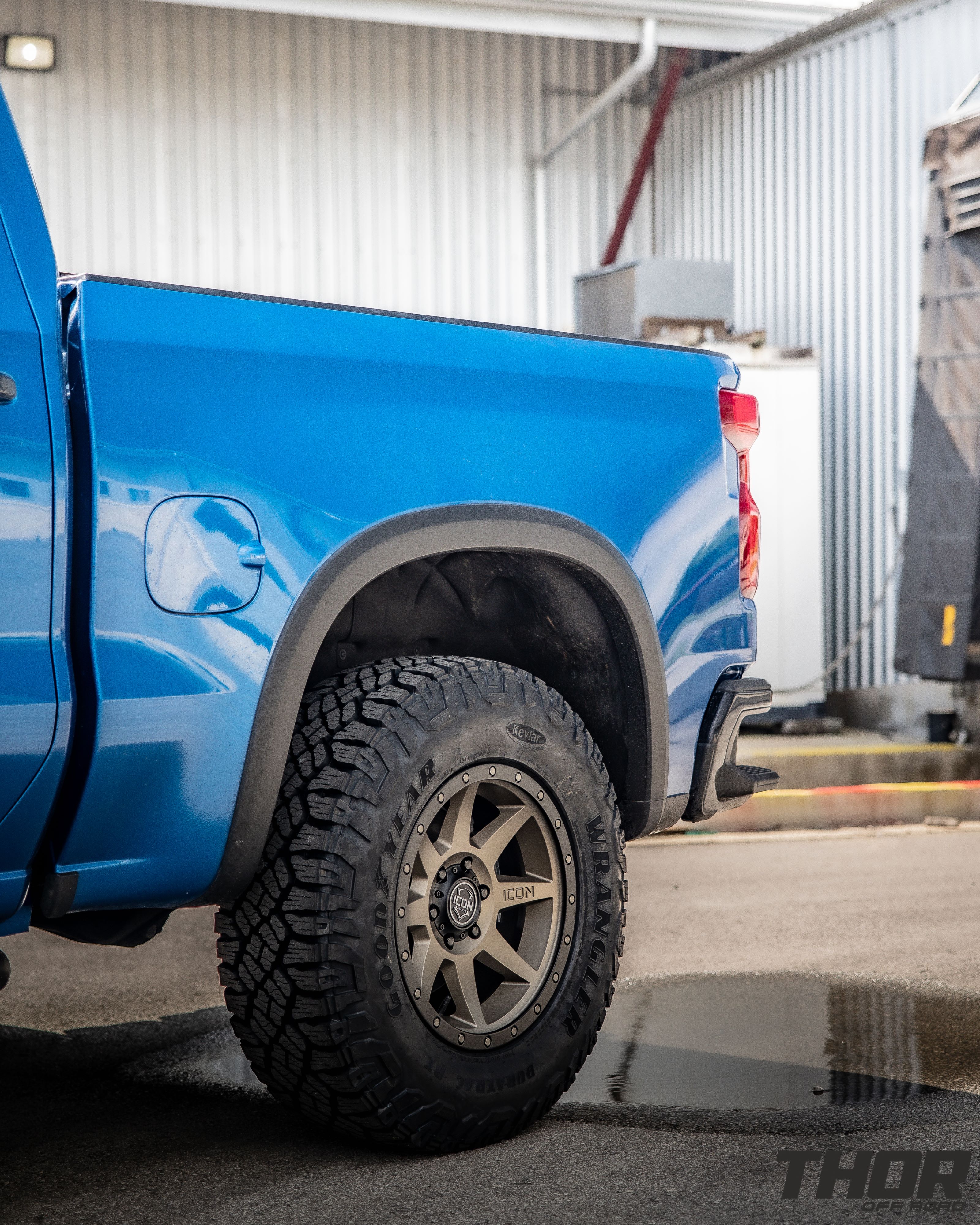 2024 Chevrolet Silverado 1500 ZR2 in Blue with Leveling Kit, Icon Rebound 18x9" Wheels, 295/70R18 Wrangler Duratrac RT Tires, Lomax Bed Cover