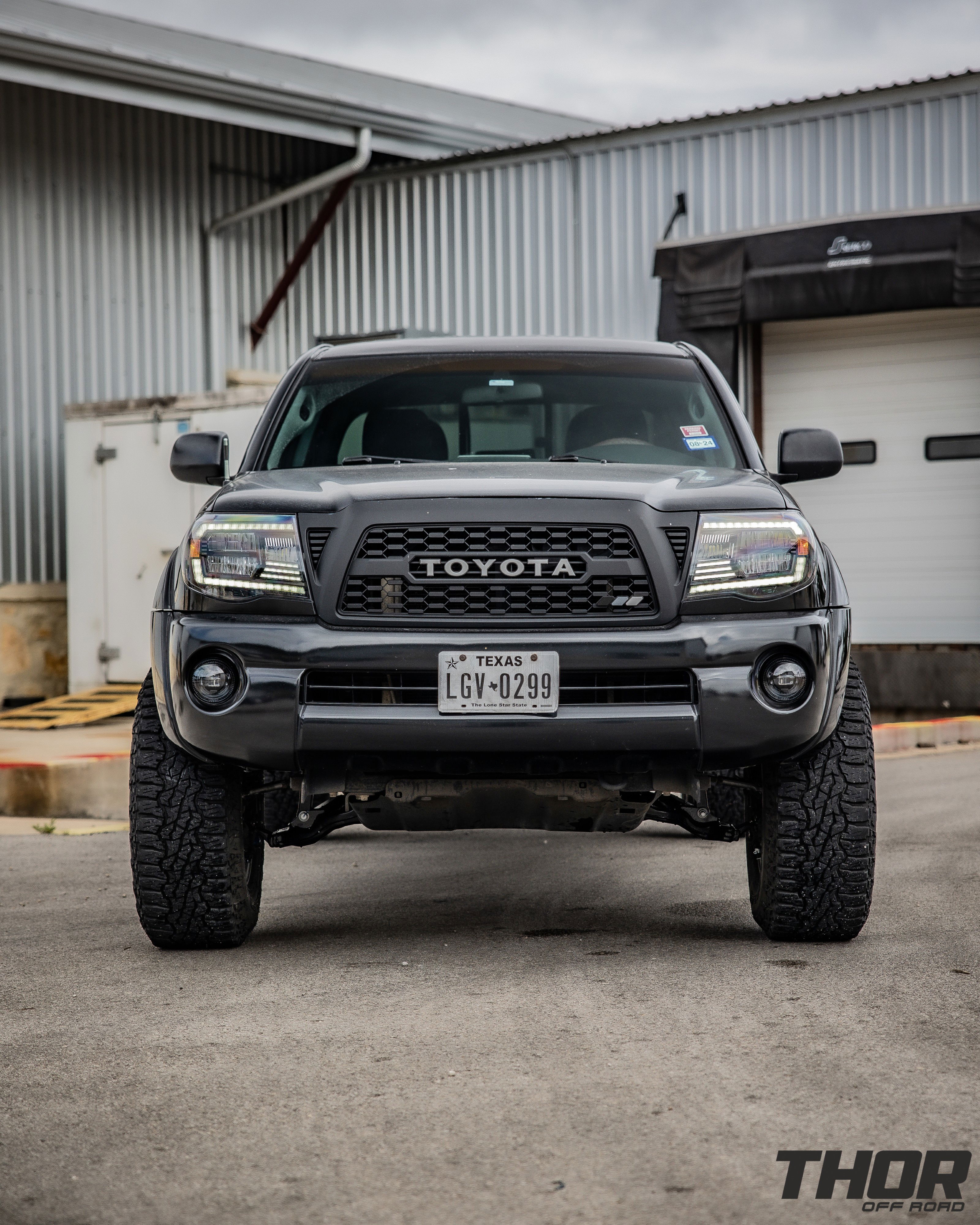 2008 Toyota Tacoma PreRunner in Black with 2.5" Icon Dynamics Remote Reservoir Suspension Kit, Icon Tubular Front Upper Control Arms