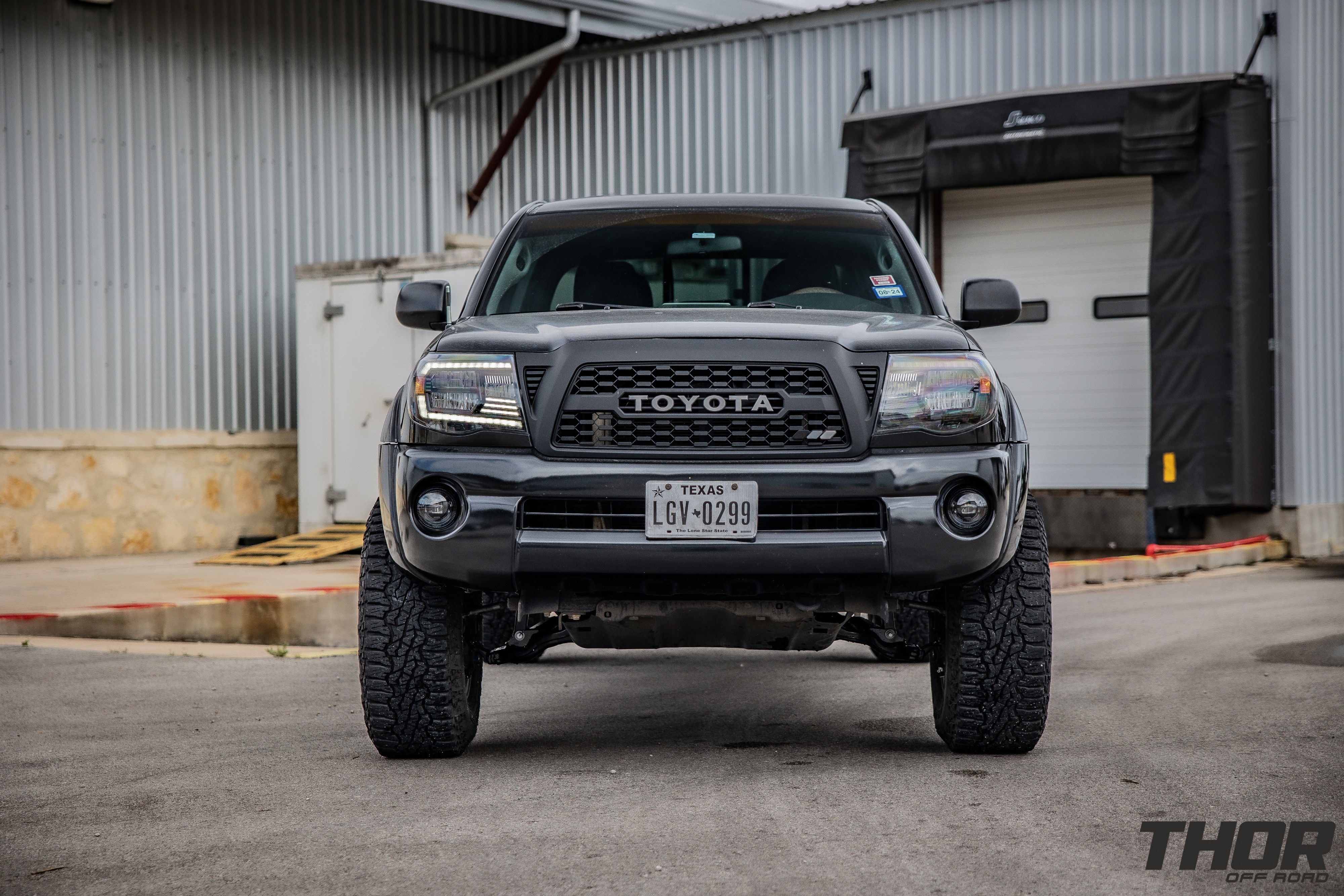 2008 Toyota Tacoma PreRunner in Black with 2.5" Icon Dynamics Remote Reservoir Suspension Kit, Icon Tubular Front Upper Control Arms