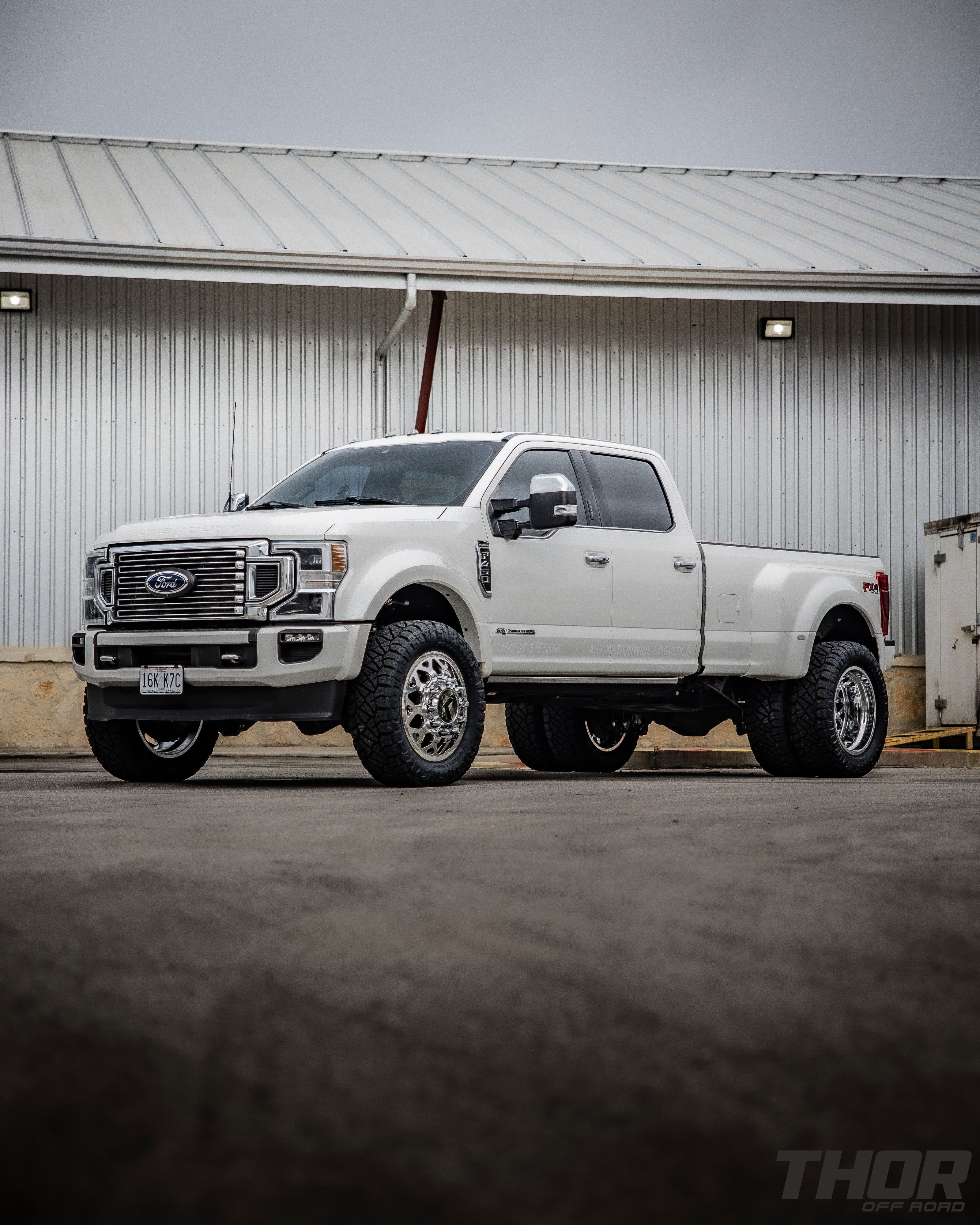 2022 Ford F-450 Super Duty Platinum in White with Carli 3.5" E-Venture Suspension Kit, Carli Sway Bar, Carli Fabricated Radius Arms, Carli Full Rear Spring Replacement, LoadLifter 5000 Air Spring Kit, 22" KG1 Forged KD006 Wheels, 37x12.50R22 Nitto Ridge Grappler Tires