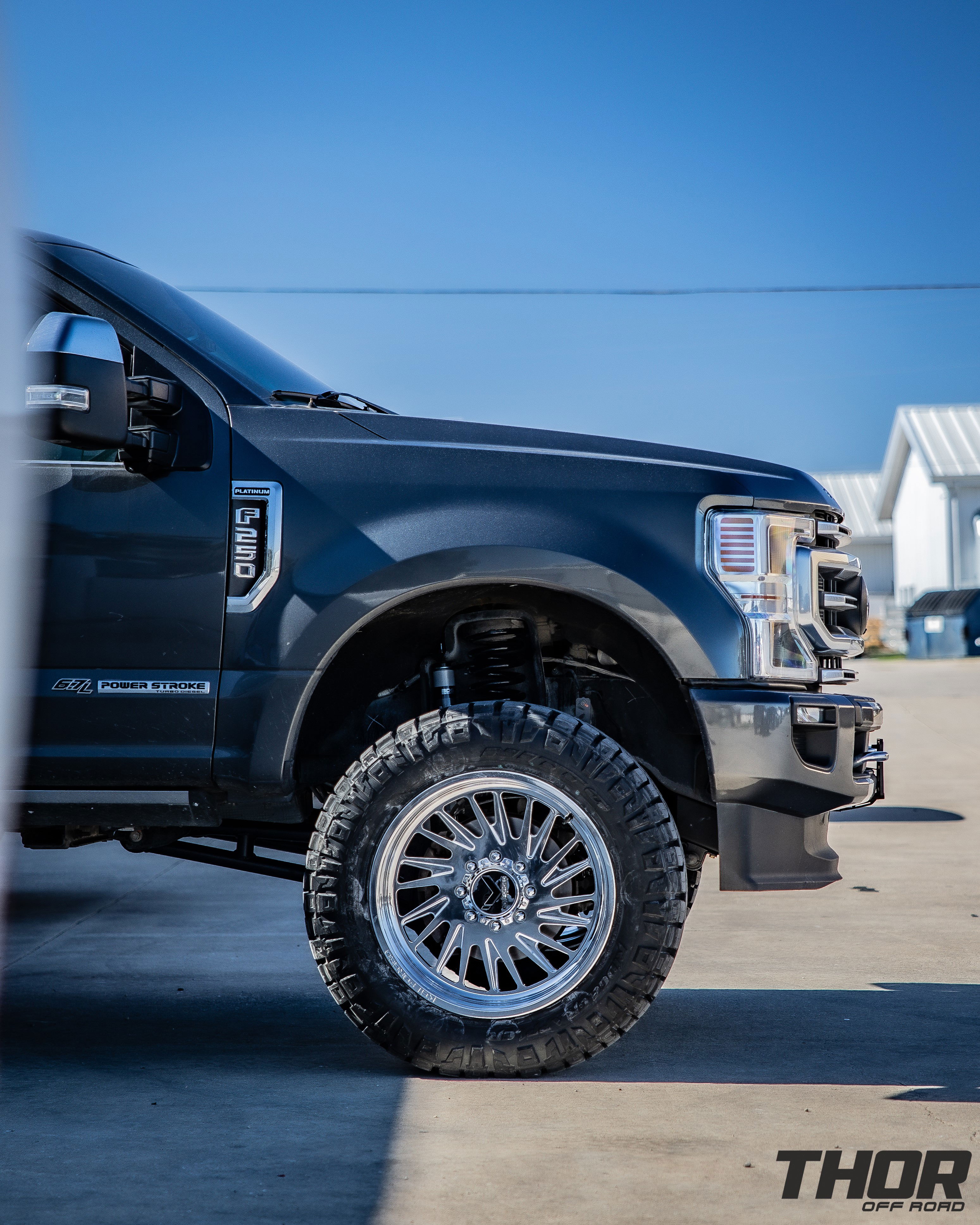 2020 Ford F-250 Super Duty Platinum in Grey with BDS 4" RA Suspension Kit with Fox 2.0 Shocks, KG1 22x10" Javelin Wheels, 37x12.50R22 Nitto Ridge Grappler Tires, Tremor Air Dam