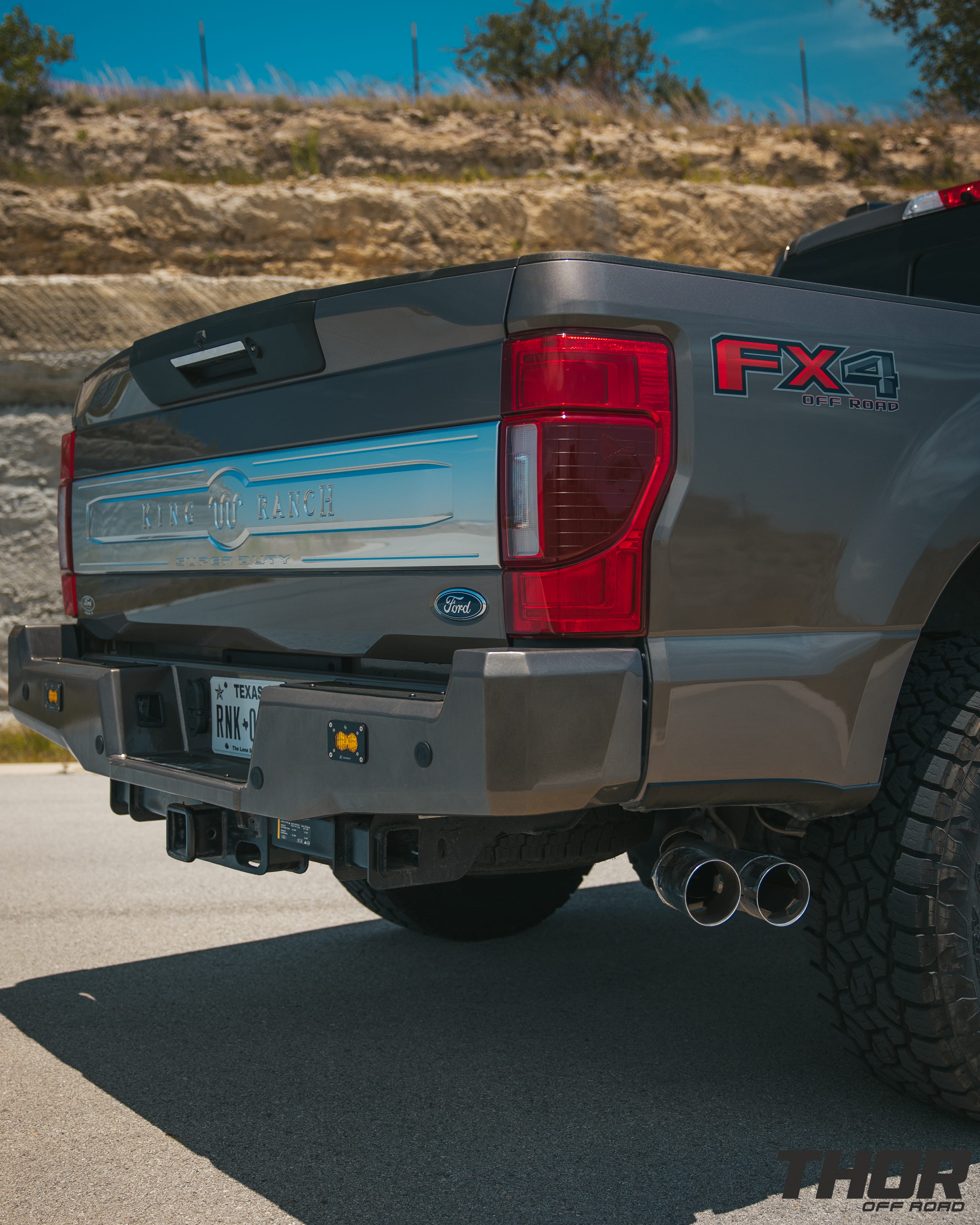 2022 Ford F-250 Super Duty King Ranch in Stone Grey with 3.5" Carli King Pintop Suspension Kit, Carli Torsion Sway Bar, Carli Fabricated Radius Arms, Carli Rear Full Leaf Springs, 20" Fuel Blitz Wheels, 37x12.50R20 Toyo ATIII Tires, CJC Front and Rear Bumpers, Baja Design XL Squadron Lighting, Warn 12S Winch