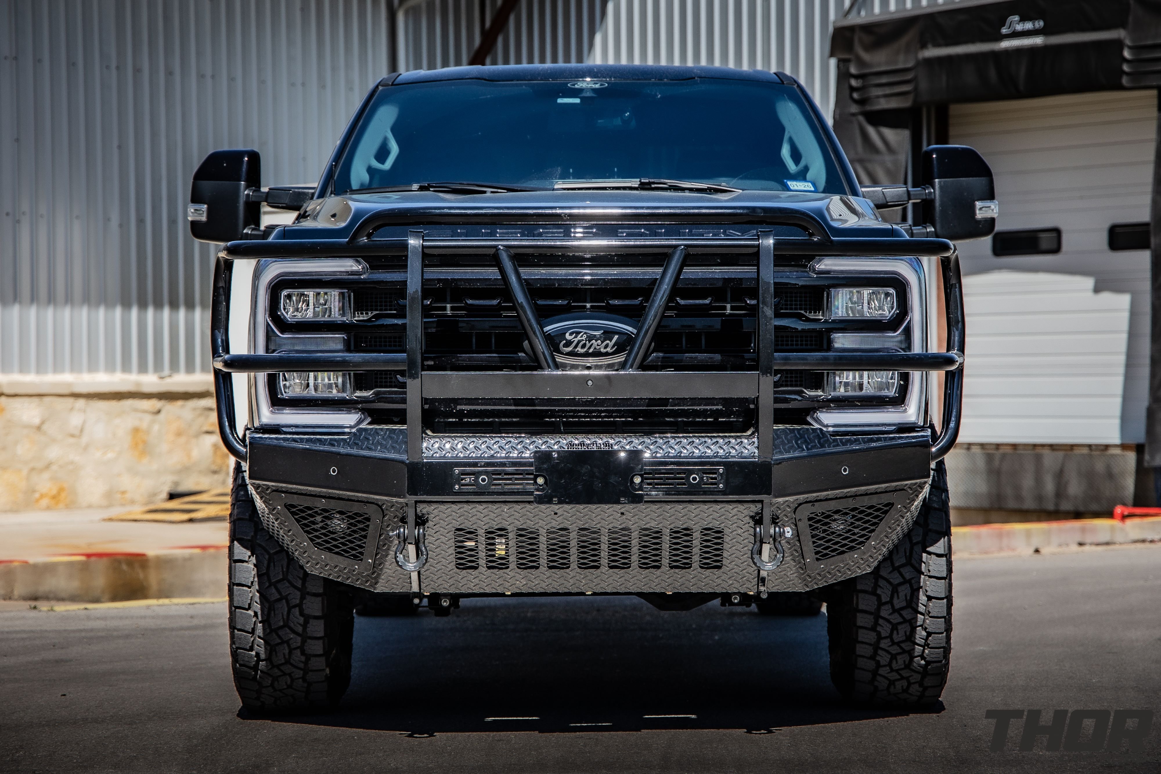 2024 Ford F-250 Super Duty Lariat in Black with ReadyLift 1.5" Leveling Kit, Method MR707 Wheels, BodyGuard T2 Extreme Front Bumper, S&B 60 Gallon Fuel Tank, Retrax Pro MX Bed Cover