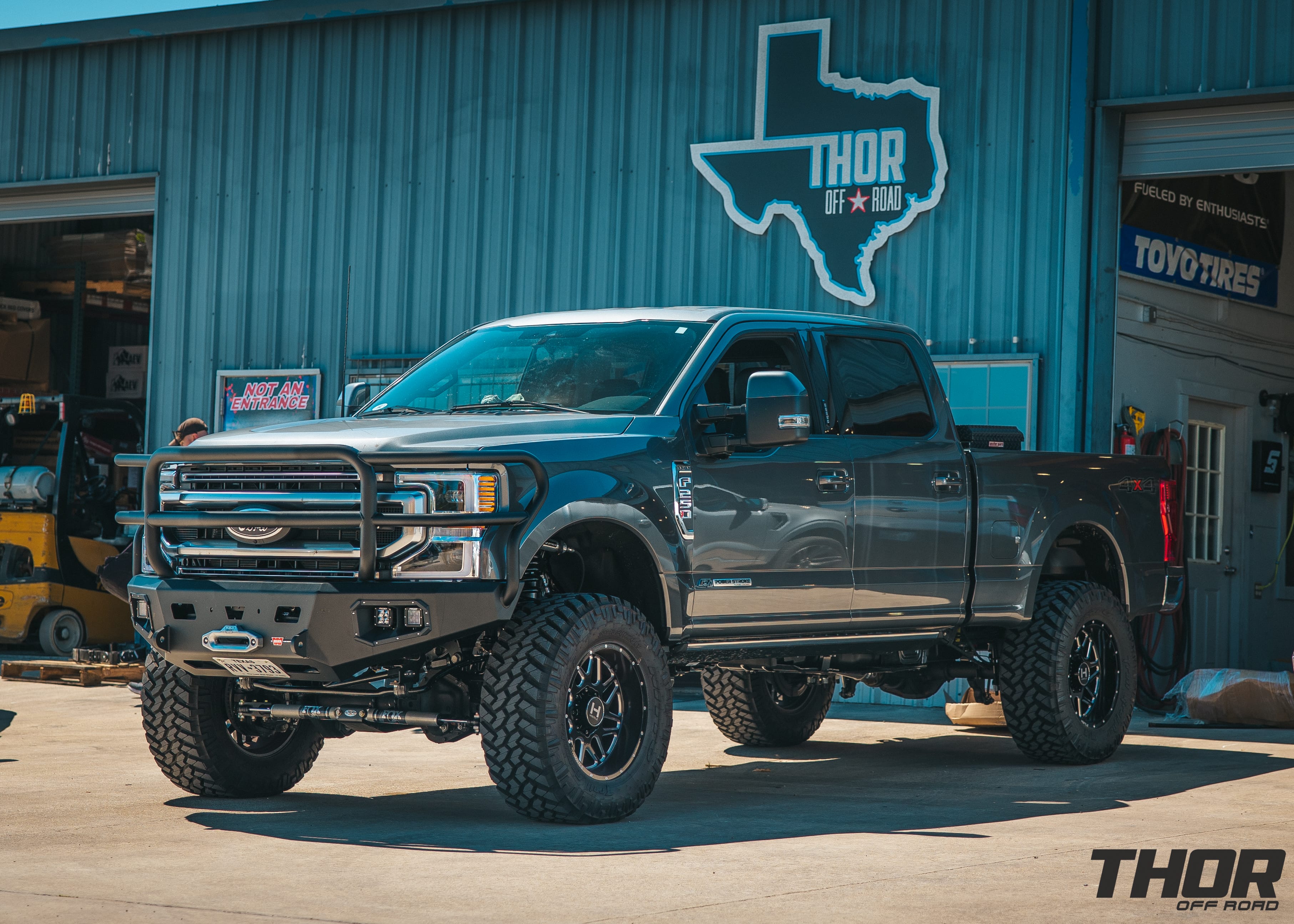 2022 Ford F-250 Super Duty Lariat in Grey with 4.5" One Up Offroad Suspension Kit, Radflow Resevoir Shocks, 20x10" Hostile Wheels, 37x13.50R20 Nitto Trail Grappler Tires, ARB Apex Front Bumper, Rigid Pod Lights