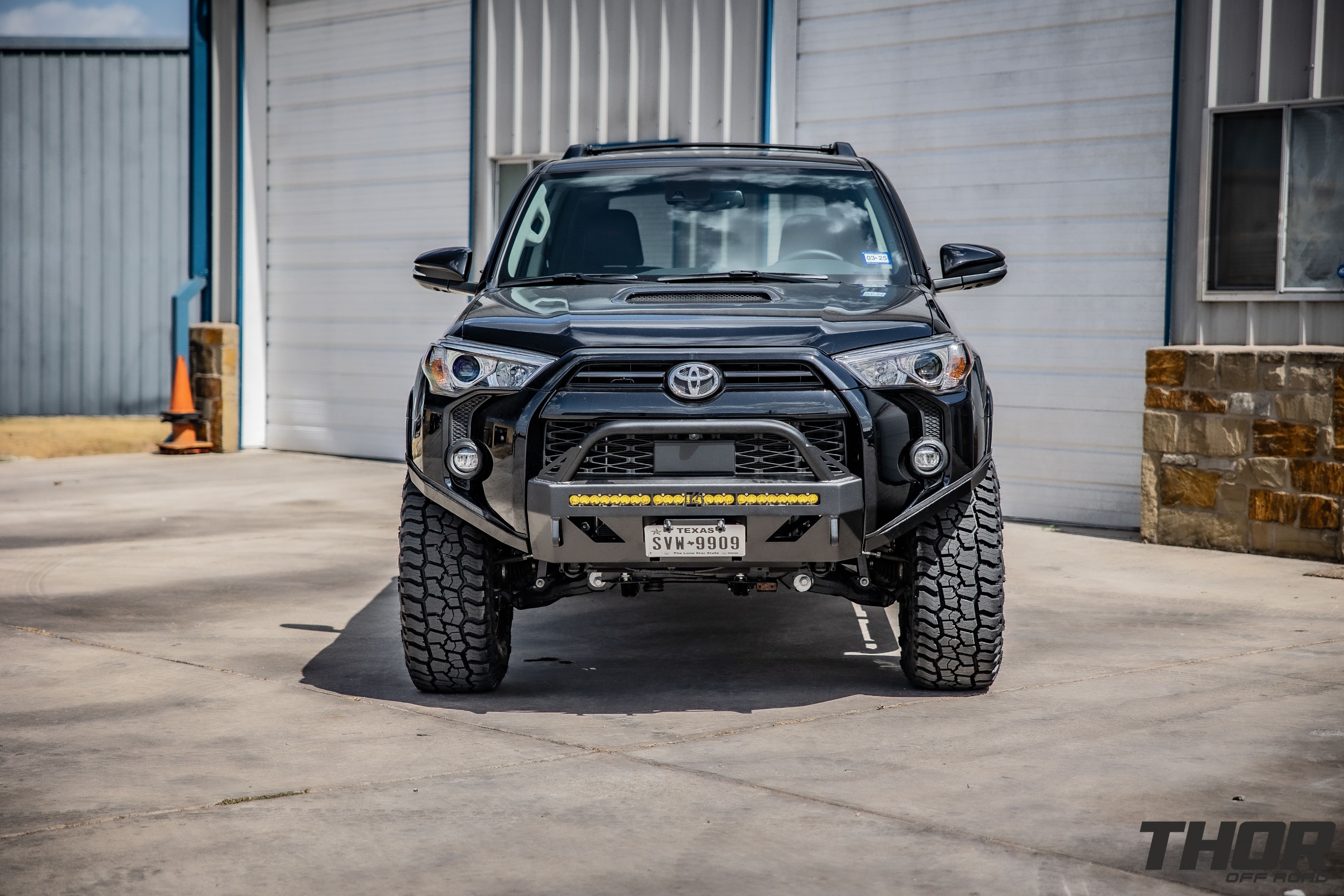 2020 Toyota 4Runner TRD Off-Road in Black with Icon 0-3.5" Stage 5 Suspension System with Tubular UCA, 17x9" Fuel Zephyr Bronze Wheels, 295/70R17 Baja Boss AT Tires, C4 Low Pro Bumper with Lighting, Borla Catback Touring Exhaust