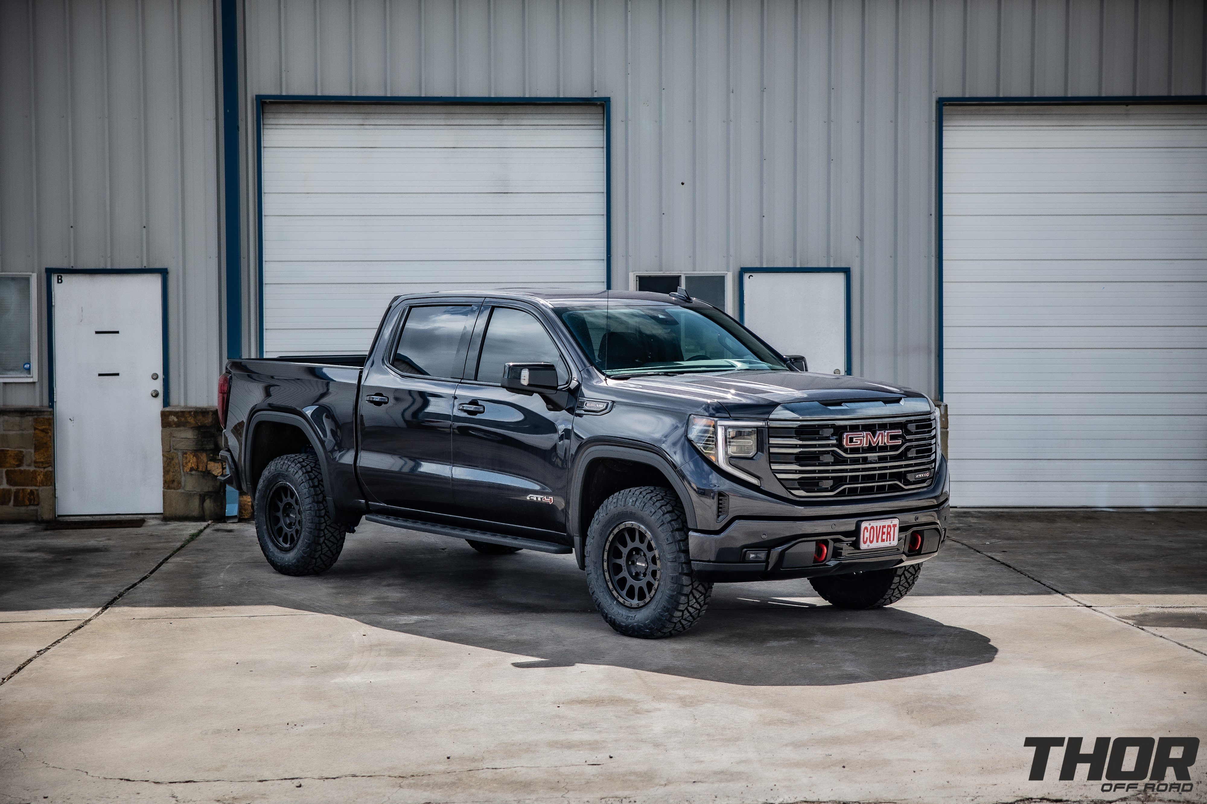 2024 GMC Sierra 1500 AT4 in Black with Cognito 1" Elite Leveling Kit with King 2.5 Shocks, Method 305NV Double Black 18x9" +18 Wheels, 295/70R18 Nitto Ridge Grappler Tires