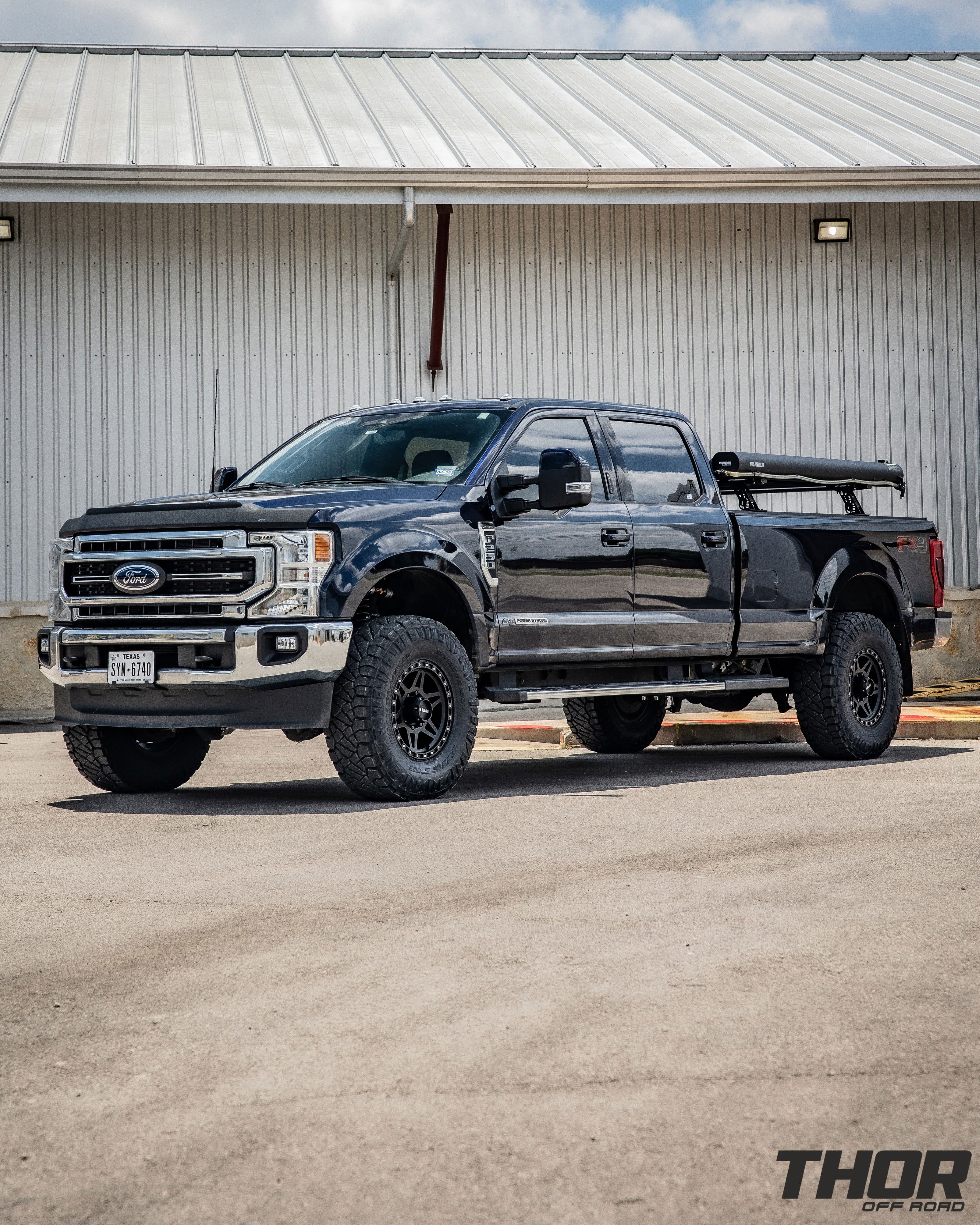 2022 Ford F-250 Super Duty Lariat in Black with Carli Backcountry 3.5" Suspension Kit, Carli 3.5" Full Rear Spring Replacement, Carli 3.5" Fabricated Radius Arms, Fox ATS Steering Stabilizer, Carli Torsion Sway Bar, Method MR312 Matte Black 18x9" Wheels, Nitto Ridge Grappler 37x12.50R18 Tires