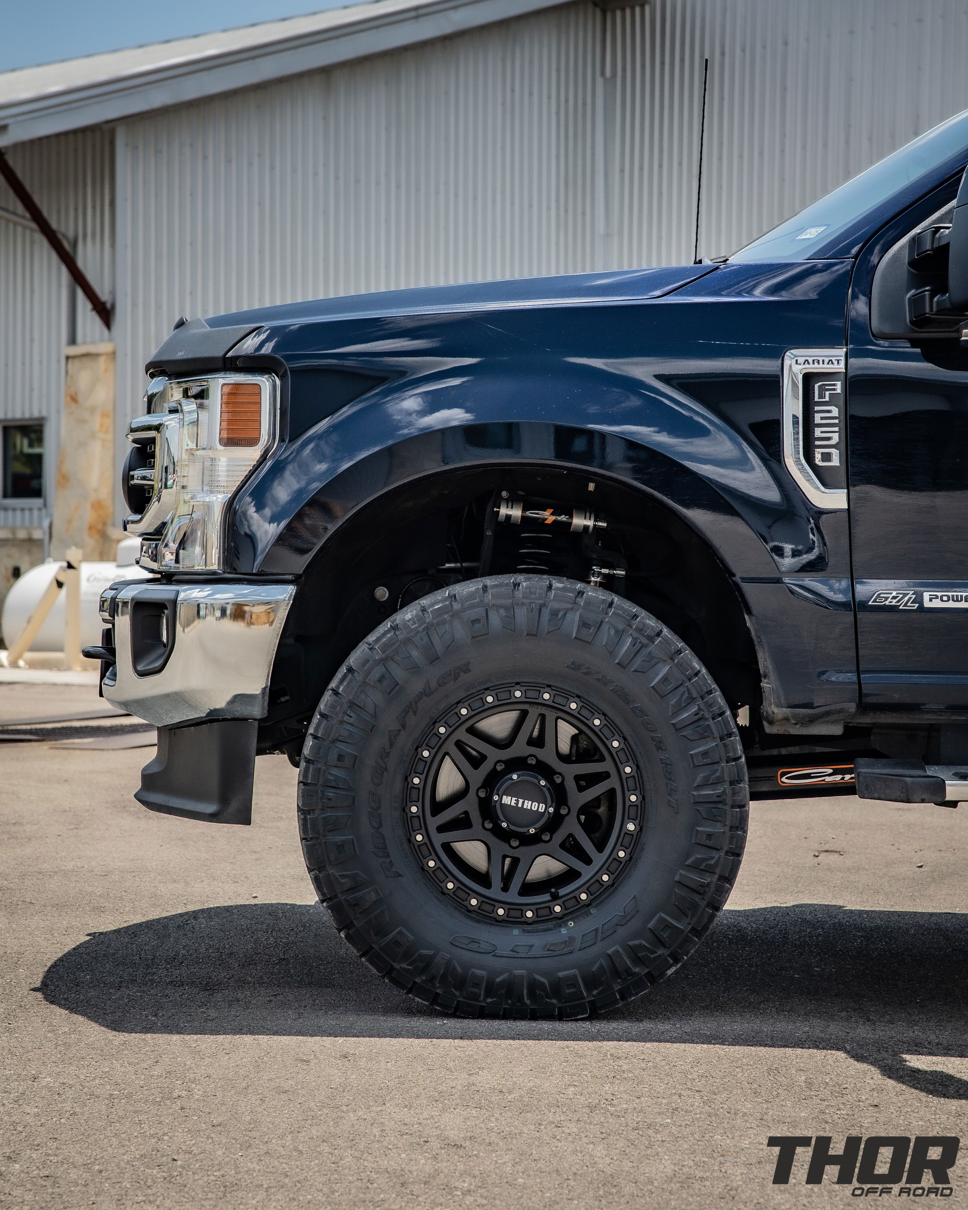 2022 Ford F-250 Super Duty Lariat in Black with Carli Backcountry 3.5" Suspension Kit, Carli 3.5" Full Rear Spring Replacement, Carli 3.5" Fabricated Radius Arms, Fox ATS Steering Stabilizer, Carli Torsion Sway Bar, Method MR312 Matte Black 18x9" Wheels, Nitto Ridge Grappler 37x12.50R18 Tires