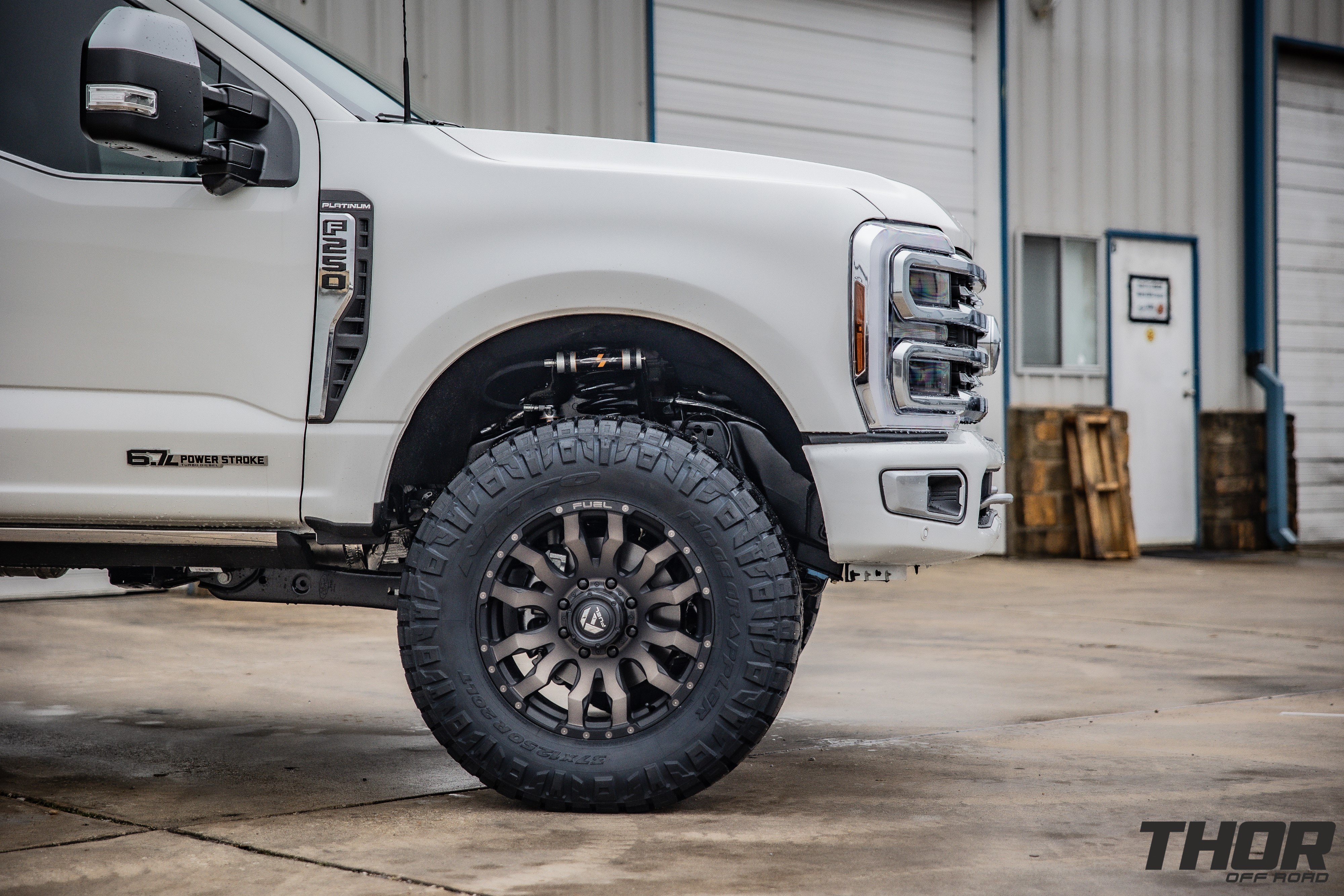 2024 Ford F-250 Super Duty Platinum in White with Carli Backcountry 3.5" Suspension Kit, Carli Sway Bar Drop Bracket, Carli Full Rear Spring Replacement, Carli High Mount Steering Stabilizer, Carli Low Mount Steering Stabilizer, Fuel Blitz 20x9" +20 Wheels, Nitto Ridge Grappler Tires